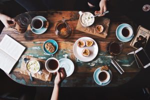 Aerial view of coffee shop with goods spread out.