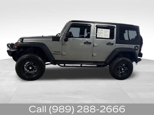 Used 2016 Jeep Wrangler Unlimited Sport S with VIN 1C4BJWDG1GL169906 for sale in Durand, MI