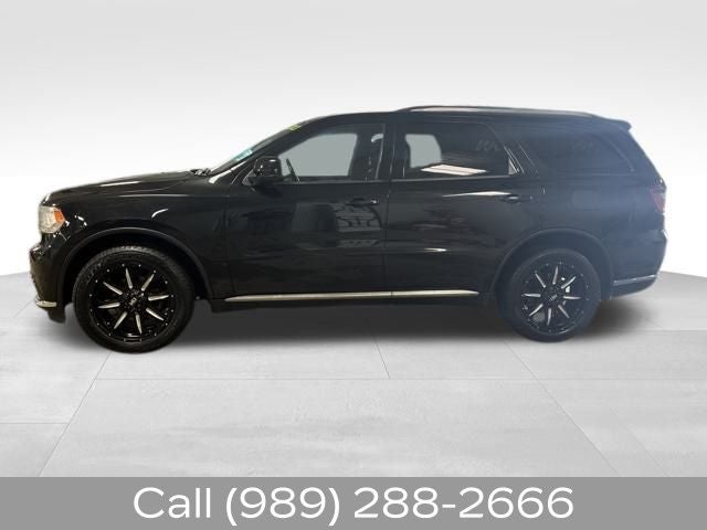 Used 2014 Dodge Durango SXT with VIN 1C4RDJAG8EC587860 for sale in Durand, MI